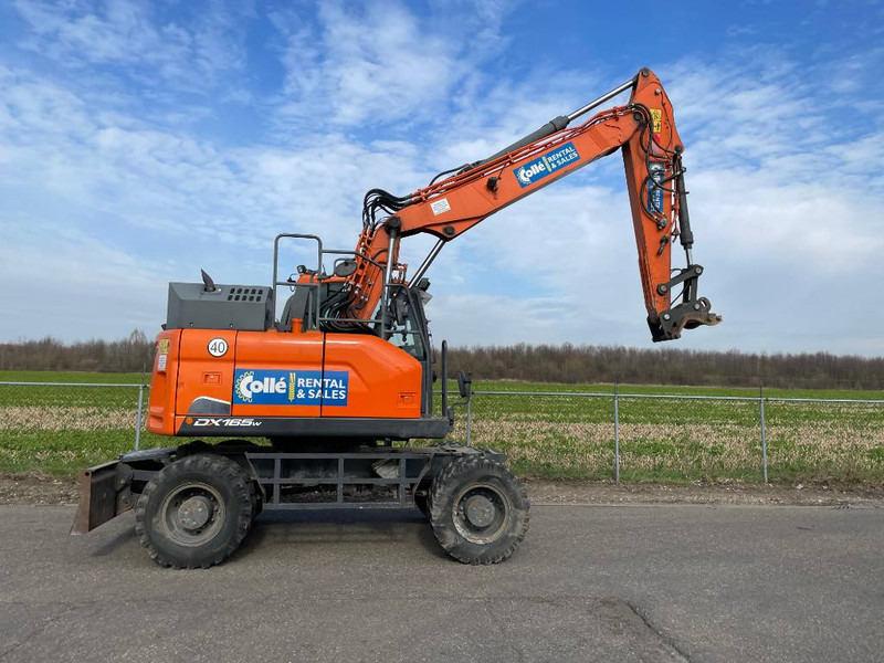 Doosan DX165W-5 - Колёсный экскаватор: фото 4 Doosan DX165W-5 - Колёсный экскаватор: фото 4