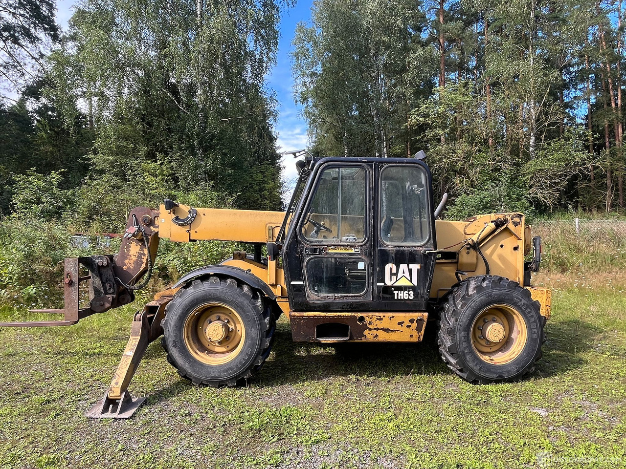 Caterpillar TH63, kurottaja piikeillä ja kauhalla, 2002, Loppi - Сельскохозяйственная техника: фото 3 Caterpillar TH63, kurottaja piikeillä ja kauhalla, 2002, Loppi - Сельскохозяйственная техника: фото 3