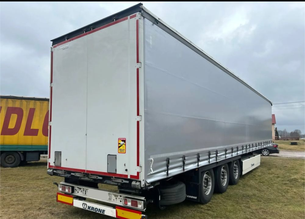 Krone STANDARD 2021 podnoszona oś OPONY 70% / STAN BARDZO DOBRY / OD PIERWSZEGO WŁAŚCICIELA / PALECIARA / TOP / sprowadzona z Niemiec !! - Тентованный полуприцеп: фото 1 Krone STANDARD 2021 podnoszona oś OPONY 70% / STAN BARDZO DOBRY / OD PIERWSZEGO WŁAŚCICIELA / PALECIARA / TOP / sprowadzona z Niemiec !! - Тентованный полуприцеп: фото 1