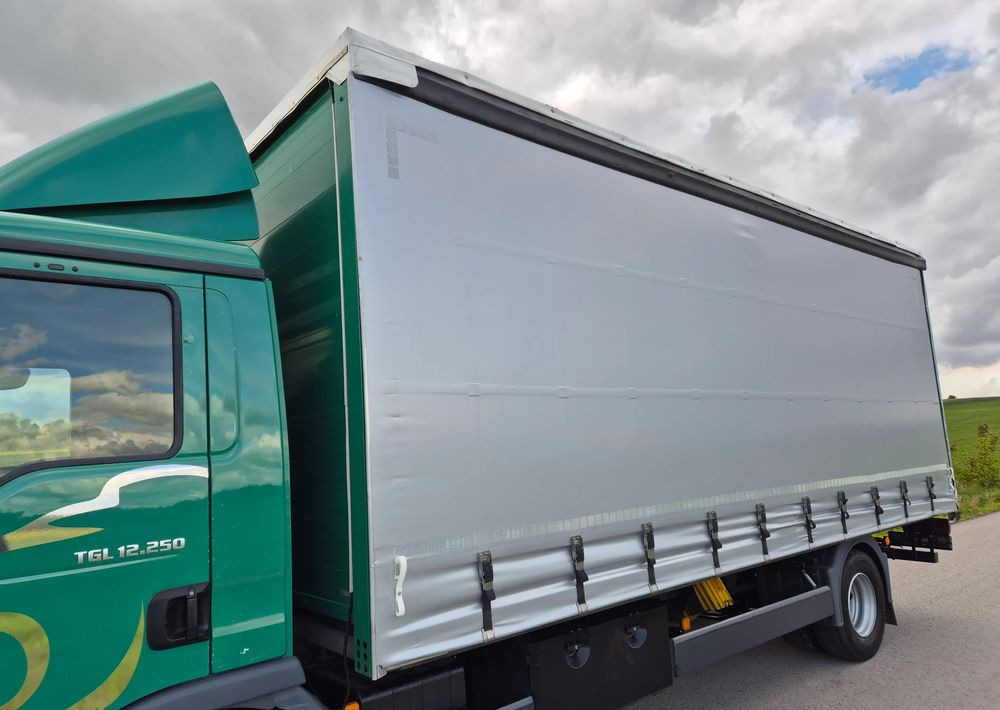 MAN TGL 12.250 6.2m AUTOMAT KLIMA z Niemiec ESP nowe opony EURO 6 / 4.75 rozstaw / zawiesie na wózek widłowy / TOP STAN / okazja nauka jazdy MOŻLIWOŚĆ DOSTOSOWANIA 12t - Тентованный грузовик: фото 4 MAN TGL 12.250 6.2m AUTOMAT KLIMA z Niemiec ESP nowe opony EURO 6 / 4.75 rozstaw / zawiesie na wózek widłowy / TOP STAN / okazja nauka jazdy MOŻLIWOŚĆ DOSTOSOWANIA 12t - Тентованный грузовик: фото 4