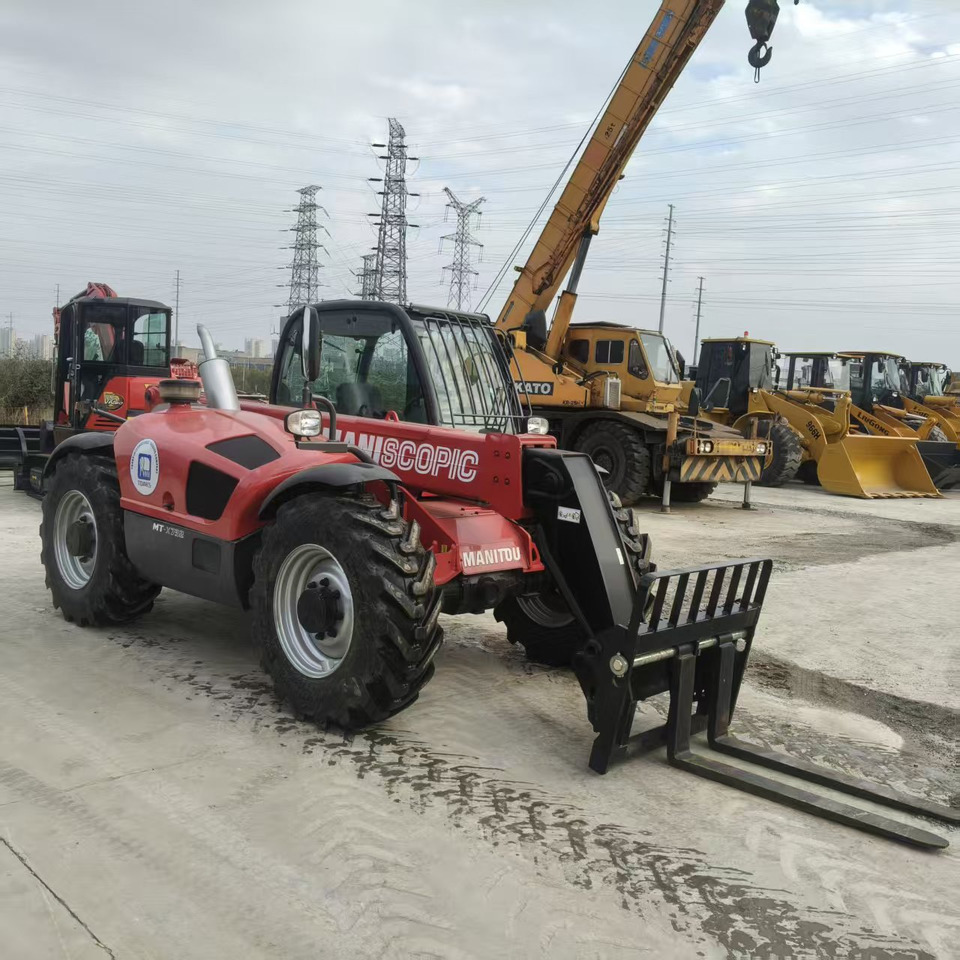 MANITOU MT-X732 - Телескопический погрузчик: фото 2 MANITOU MT-X732 - Телескопический погрузчик: фото 2
