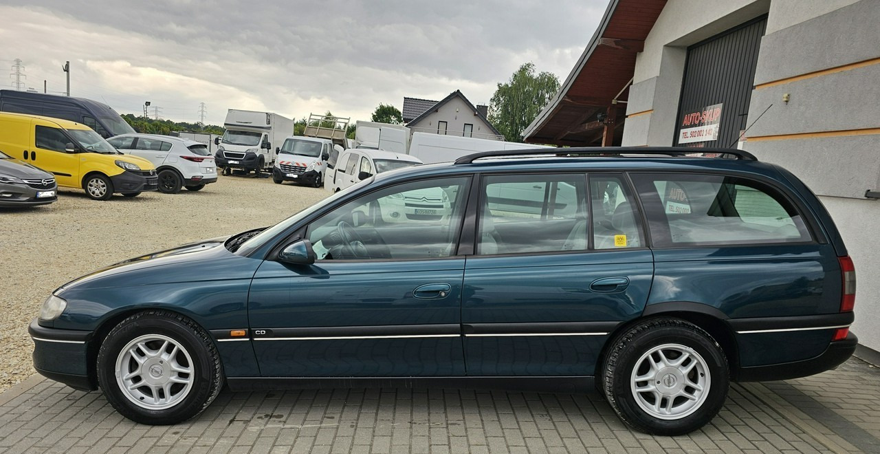 Opel Omega B 2,5 v6 *automat* napęd tył *welury* - Универсал: фото 4 Opel Omega B 2,5 v6 *automat* napęd tył *welury* - Универсал: фото 4