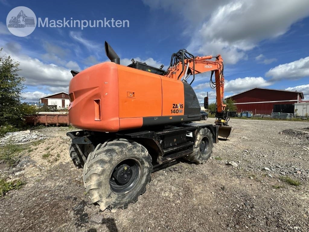 Hitachi ZX 140 W-5B - Колёсный экскаватор: фото 5 Hitachi ZX 140 W-5B - Колёсный экскаватор: фото 5