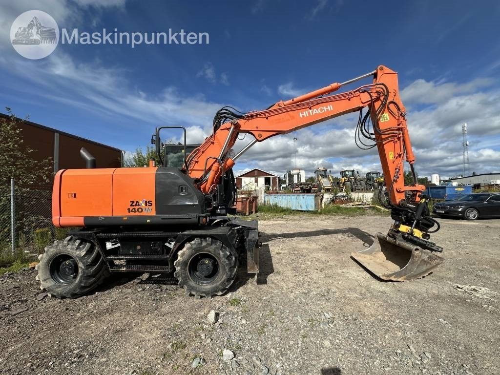 Hitachi ZX 140 W-5B - Колёсный экскаватор: фото 4 Hitachi ZX 140 W-5B - Колёсный экскаватор: фото 4