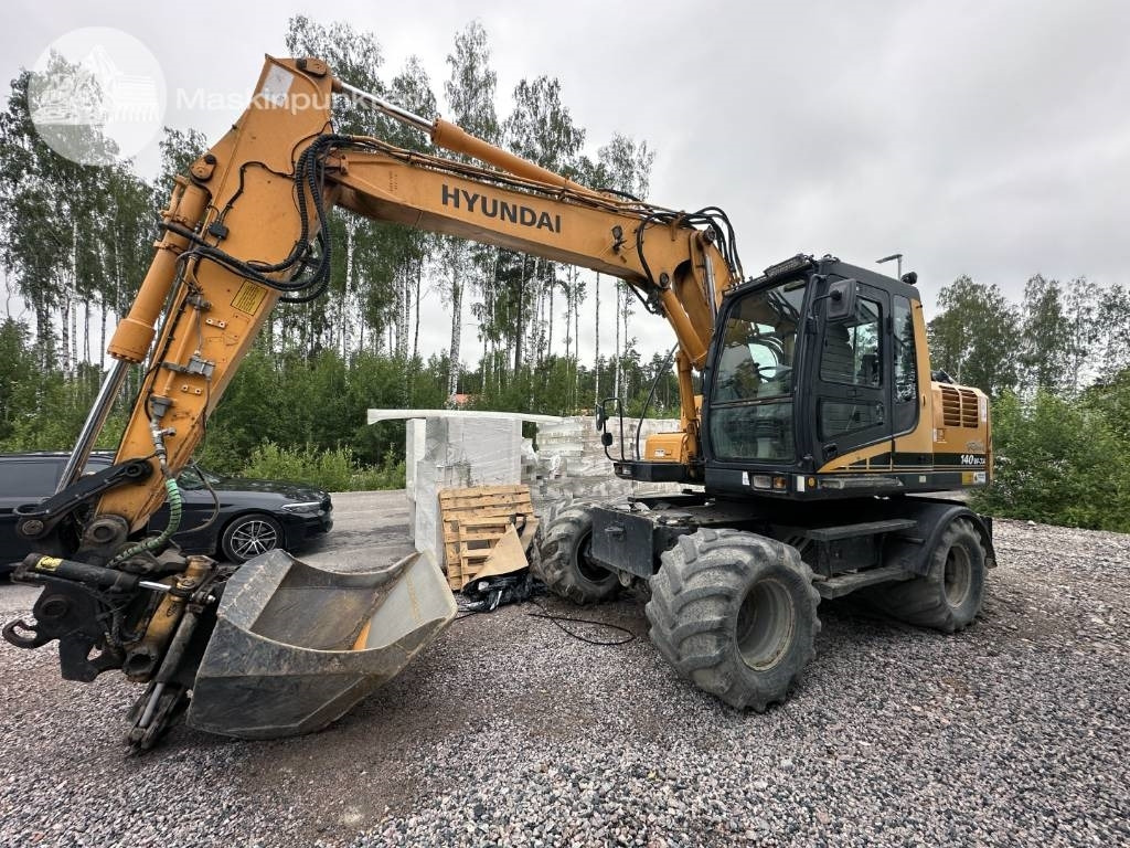 Hyundai Robex 140 W-7 A - Колёсный экскаватор: фото 1 Hyundai Robex 140 W-7 A - Колёсный экскаватор: фото 1