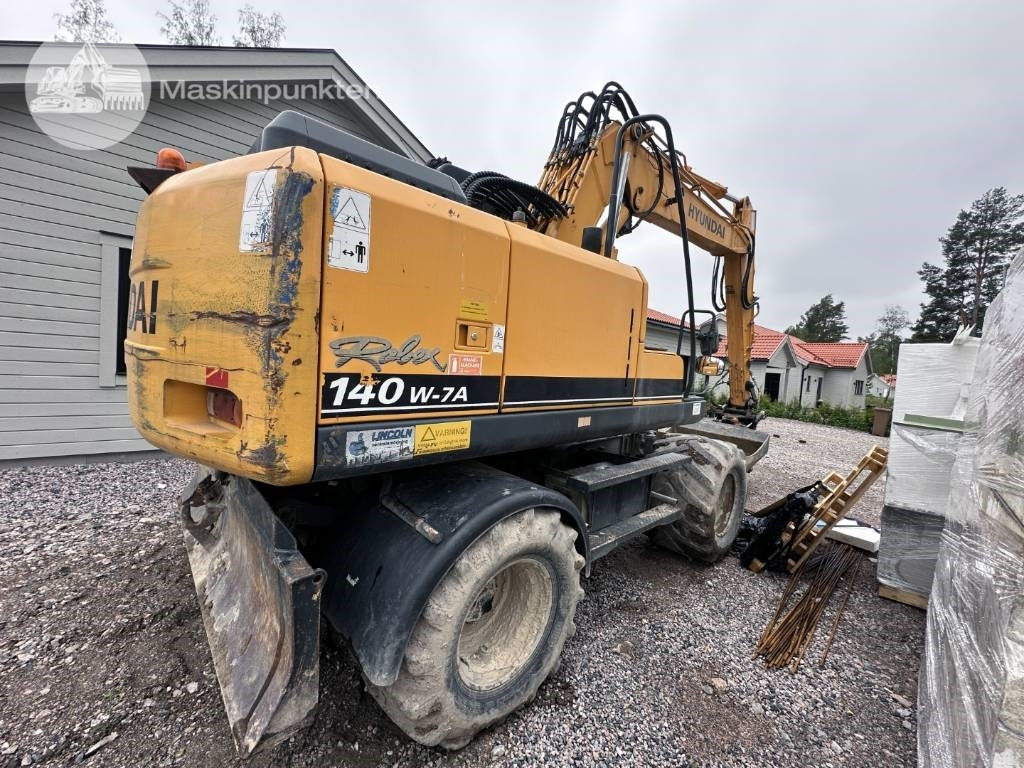 Hyundai Robex 140 W-7 A - Колёсный экскаватор: фото 4 Hyundai Robex 140 W-7 A - Колёсный экскаватор: фото 4
