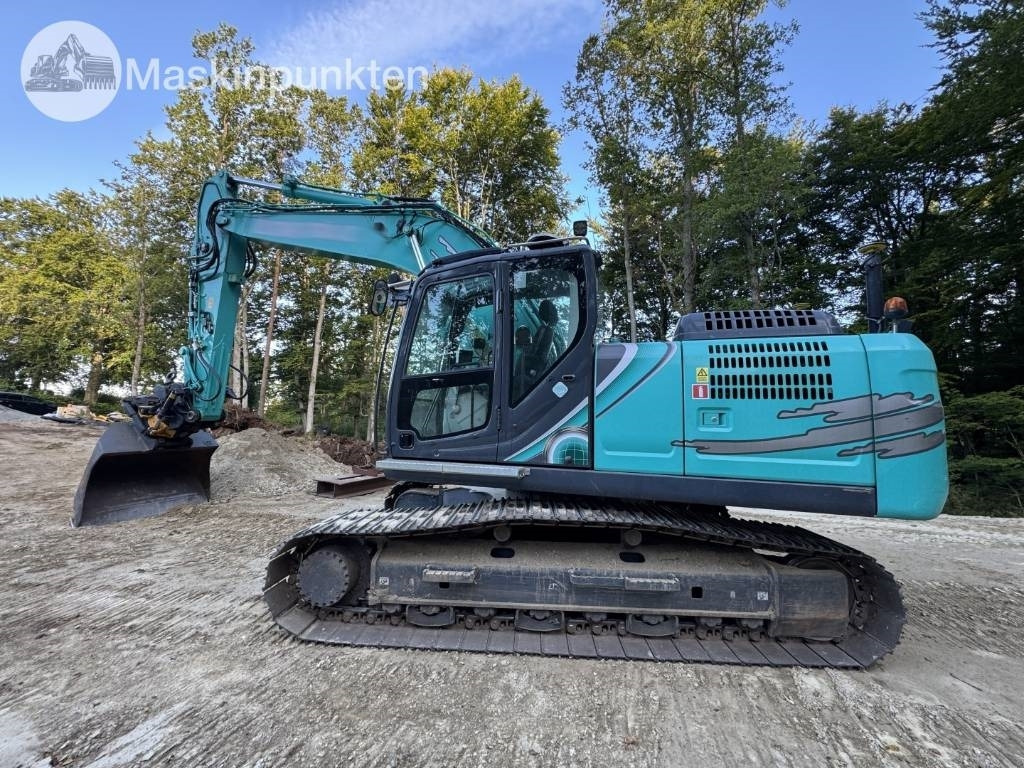 Kobelco SK 210 LC-10  - Гусеничный экскаватор: фото 2 Kobelco SK 210 LC-10  - Гусеничный экскаватор: фото 2