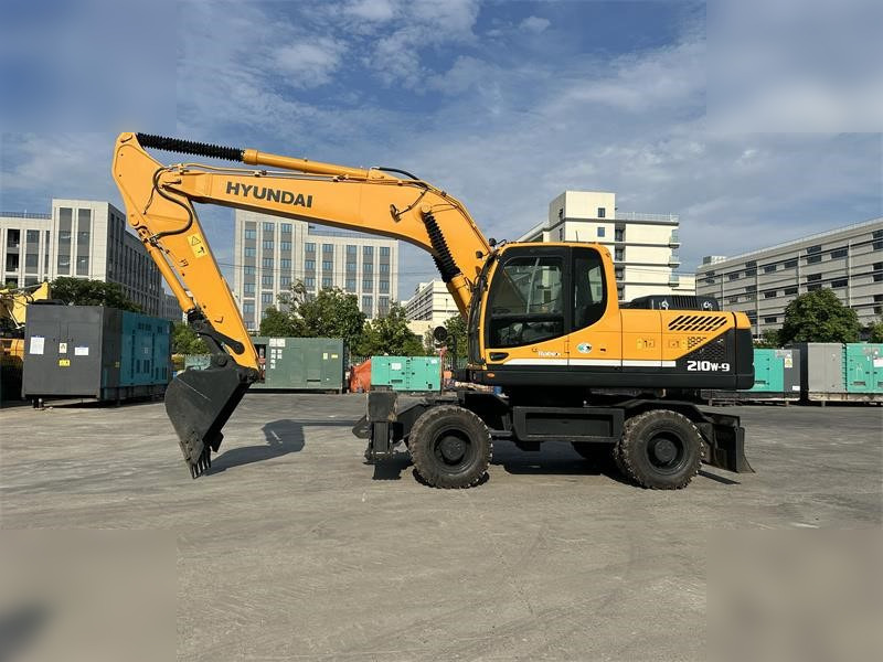 HYUNDAI ROBEX 210W-9 - Колёсный экскаватор: фото 1 HYUNDAI ROBEX 210W-9 - Колёсный экскаватор: фото 1