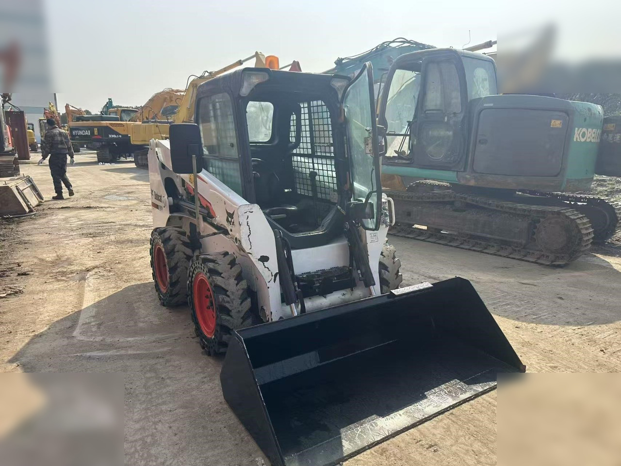 BOBCAT S550 - Мини-погрузчик с бортовым поворотом: фото 2 BOBCAT S550 - Мини-погрузчик с бортовым поворотом: фото 2