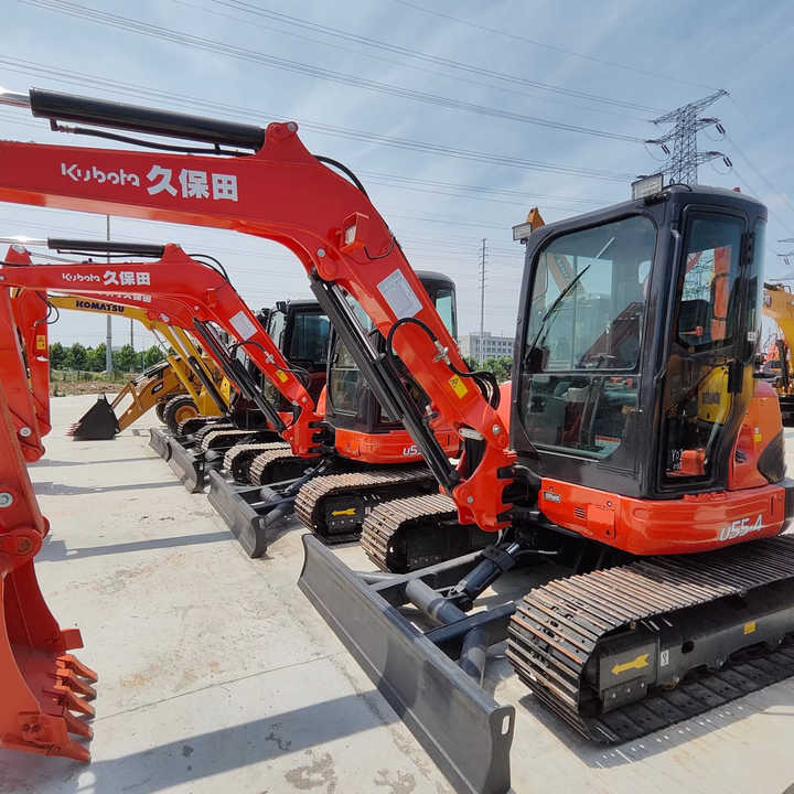 Perfect Condition Kubota U55-4 Japan Brand Mini Excavator with Pusher for Sale 90% Brand New Mini Kubota U25 35 55 5tons - Мини-экскаватор: фото 1 Perfect Condition Kubota U55-4 Japan Brand Mini Excavator with Pusher for Sale 90% Brand New Mini Kubota U25 35 55 5tons - Мини-экскаватор: фото 1