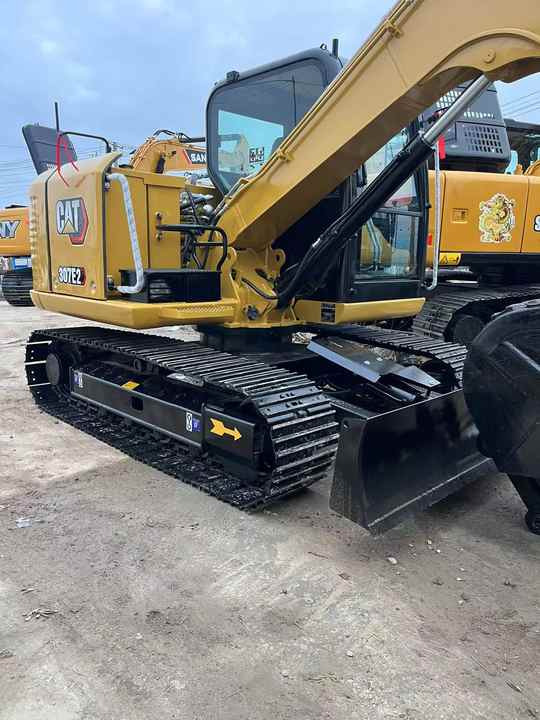 Used Caterpillar CAT 307E2 Crawler Mini Hydraulic Digger Second Hand Cat 307E2 Excavator - Экскаватор: фото 5 Used Caterpillar CAT 307E2 Crawler Mini Hydraulic Digger Second Hand Cat 307E2 Excavator - Экскаватор: фото 5