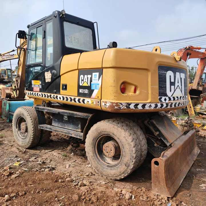 Used Digger Cat 315 Construction Machinery Construction Digger Used Cat 315 Cheap Excavator - Колёсный экскаватор: фото 1 Used Digger Cat 315 Construction Machinery Construction Digger Used Cat 315 Cheap Excavator - Колёсный экскаватор: фото 1