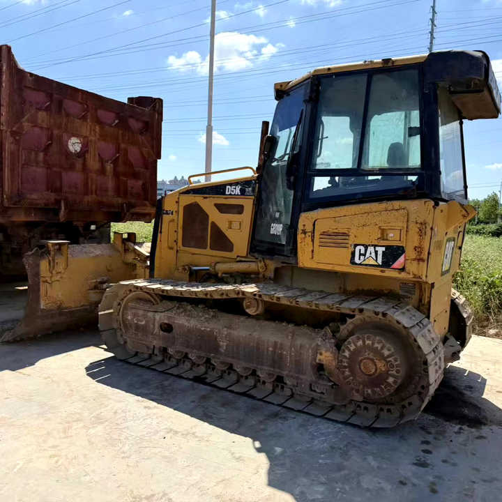 100% Original Caterpillar D5K Mini Track Dozer Cat D5K Bulldozer Superior Performance Running Working Condition Hot Sale - Бульдозер: фото 1 100% Original Caterpillar D5K Mini Track Dozer Cat D5K Bulldozer Superior Performance Running Working Condition Hot Sale - Бульдозер: фото 1