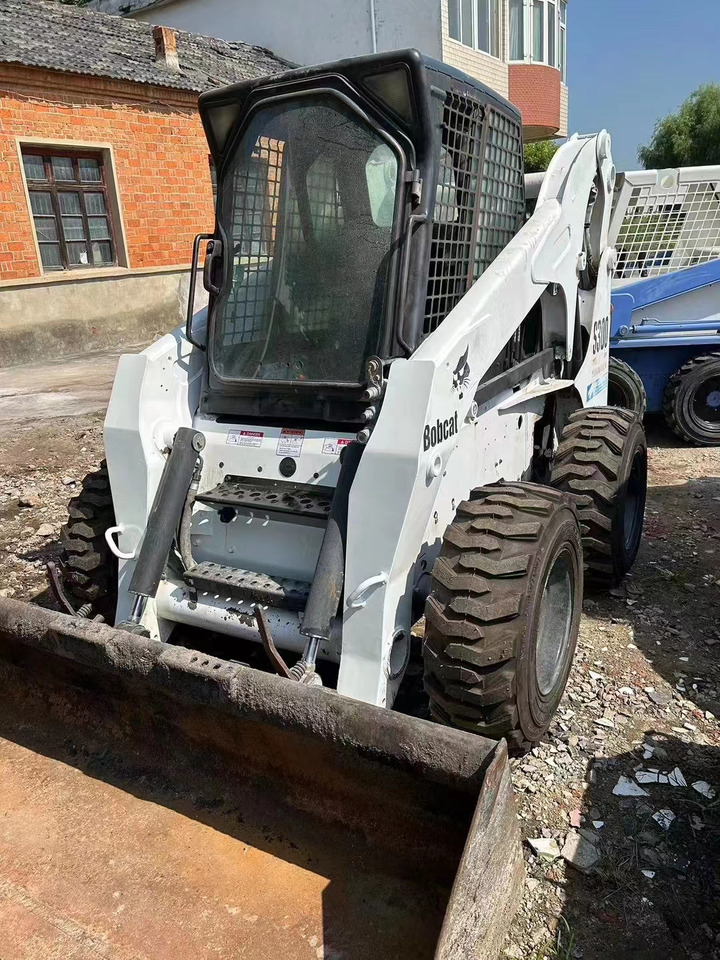 High Quality Mini Construction Machine Used Bobcat Skid Steer Loader S300 in Stock for Sale Bobcat Loader With Low Price - Строительная техника: фото 1 High Quality Mini Construction Machine Used Bobcat Skid Steer Loader S300 in Stock for Sale Bobcat Loader With Low Price - Строительная техника: фото 1