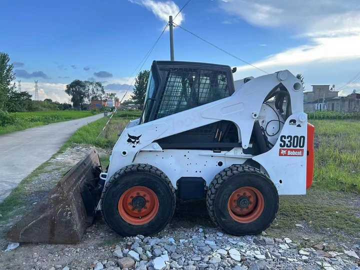 Used Bob Cat Bob Cat S300 Used Mini Skid Steer Wheel Loader Multifunctional Track Loaders Bobcat S300 - Колёсный погрузчик: фото 4 Used Bob Cat Bob Cat S300 Used Mini Skid Steer Wheel Loader Multifunctional Track Loaders Bobcat S300 - Колёсный погрузчик: фото 4