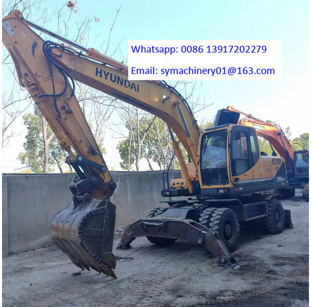 Hyundai R210W - Колёсный экскаватор: фото 2 Hyundai R210W - Колёсный экскаватор: фото 2
