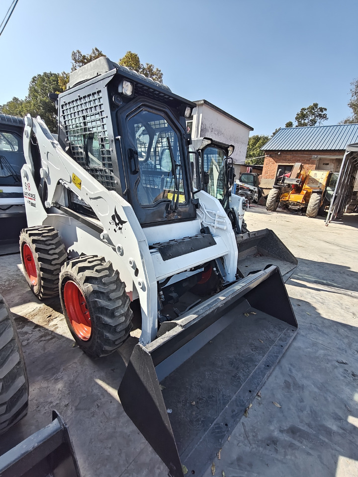 BOBCAT S18 Skid Steer Loader Click for Disconunt - Мини-погрузчик с бортовым поворотом: фото 1 BOBCAT S18 Skid Steer Loader Click for Disconunt - Мини-погрузчик с бортовым поворотом: фото 1