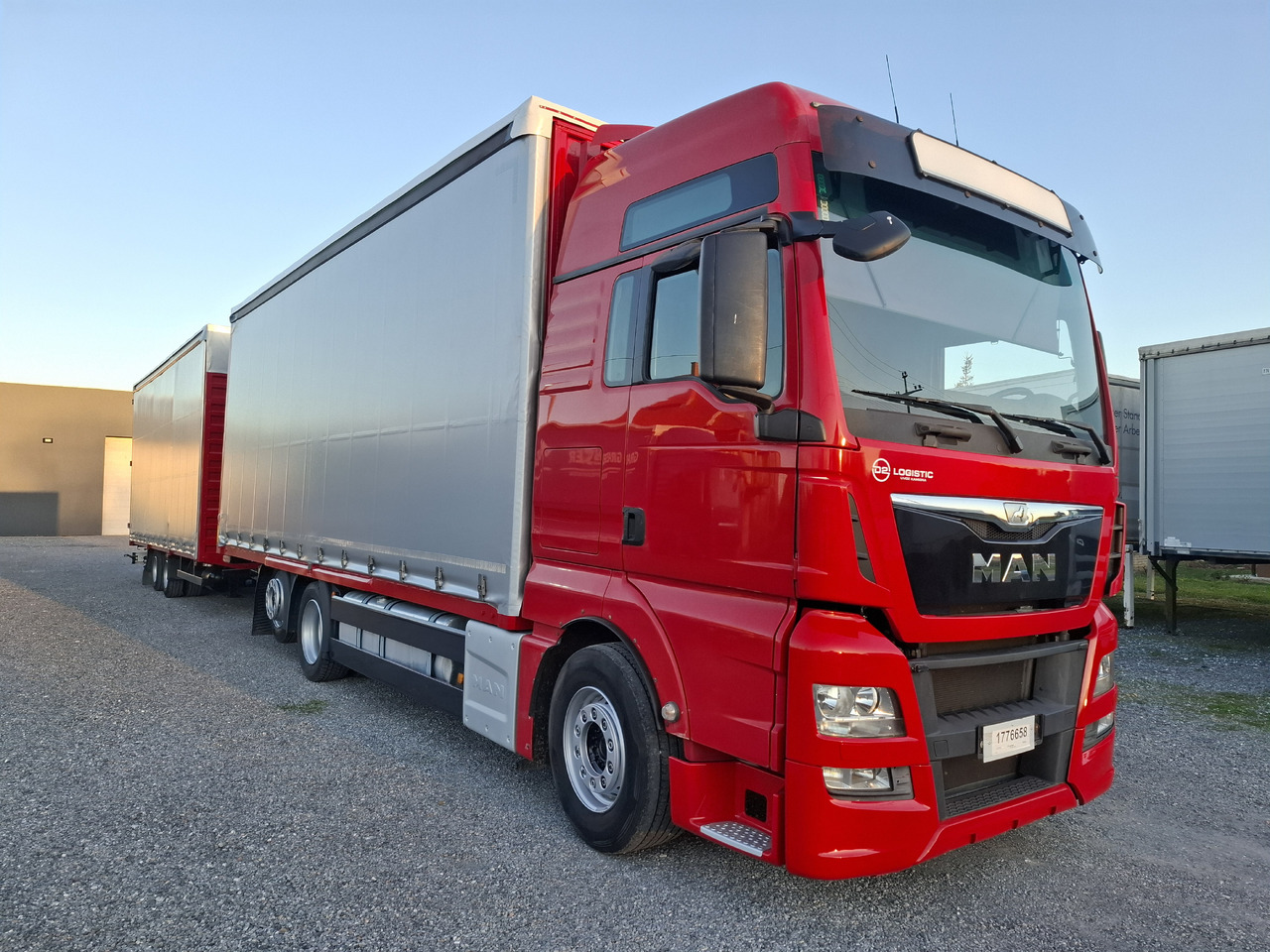 MAN TGX 26.440 E6 + SCHMITZ - Тентованный грузовик: фото 4 MAN TGX 26.440 E6 + SCHMITZ - Тентованный грузовик: фото 4