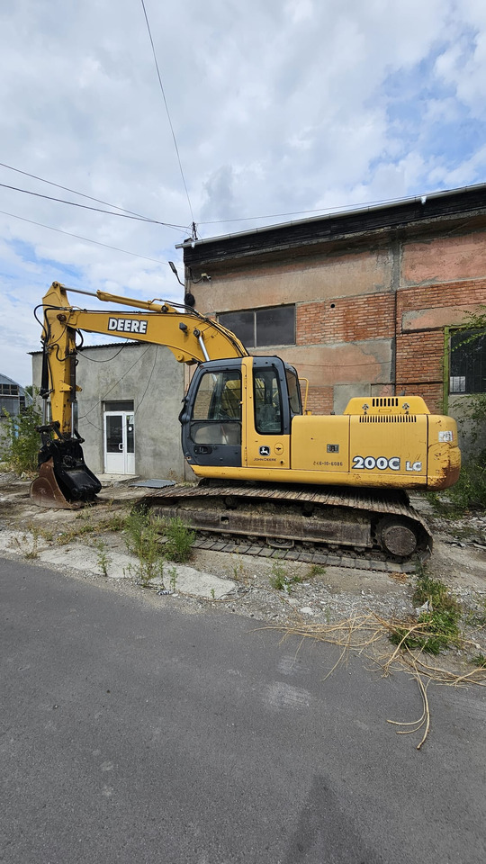 John Deere 200C LC - Гусеничный экскаватор: фото 1 John Deere 200C LC - Гусеничный экскаватор: фото 1