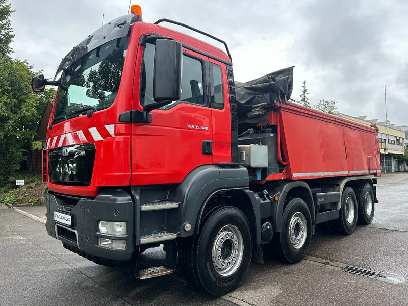 MAN TGS 35.440 8x4*blatt* FLIEGL*Asphaltschieber*Schubboden - Грузовик: фото 1 MAN TGS 35.440 8x4*blatt* FLIEGL*Asphaltschieber*Schubboden - Грузовик: фото 1