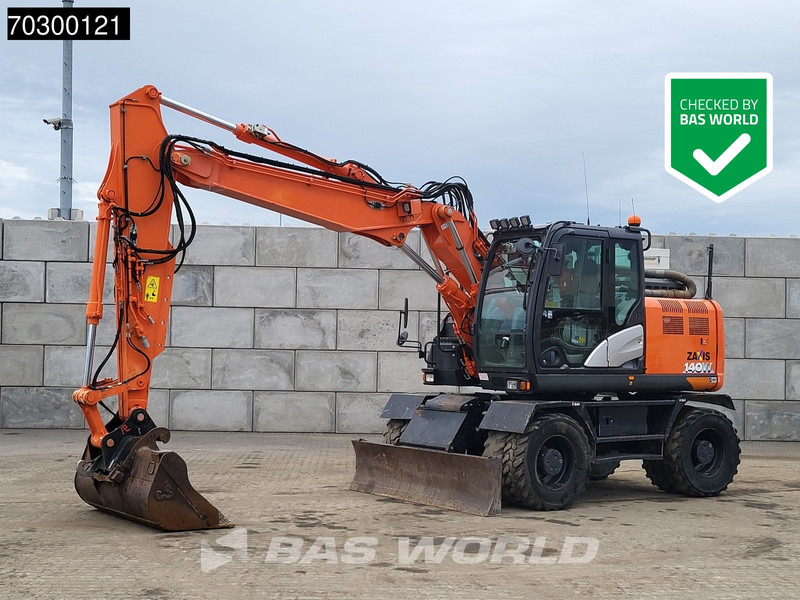 Hitachi ZX140W -6 - Колёсный экскаватор: фото 1 Hitachi ZX140W -6 - Колёсный экскаватор: фото 1