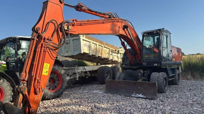 Hitachi ZX210W-3 - Колёсный экскаватор: фото 2 Hitachi ZX210W-3 - Колёсный экскаватор: фото 2