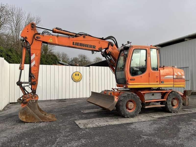 Liebherr A316 LITRONIC - Колёсный экскаватор: фото 1 Liebherr A316 LITRONIC - Колёсный экскаватор: фото 1