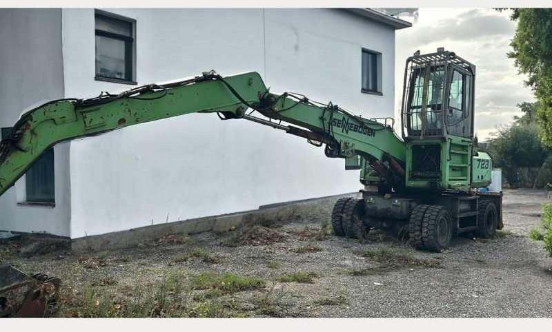 Sennebogen 723 - Перегружатель: фото 1 Sennebogen 723 - Перегружатель: фото 1