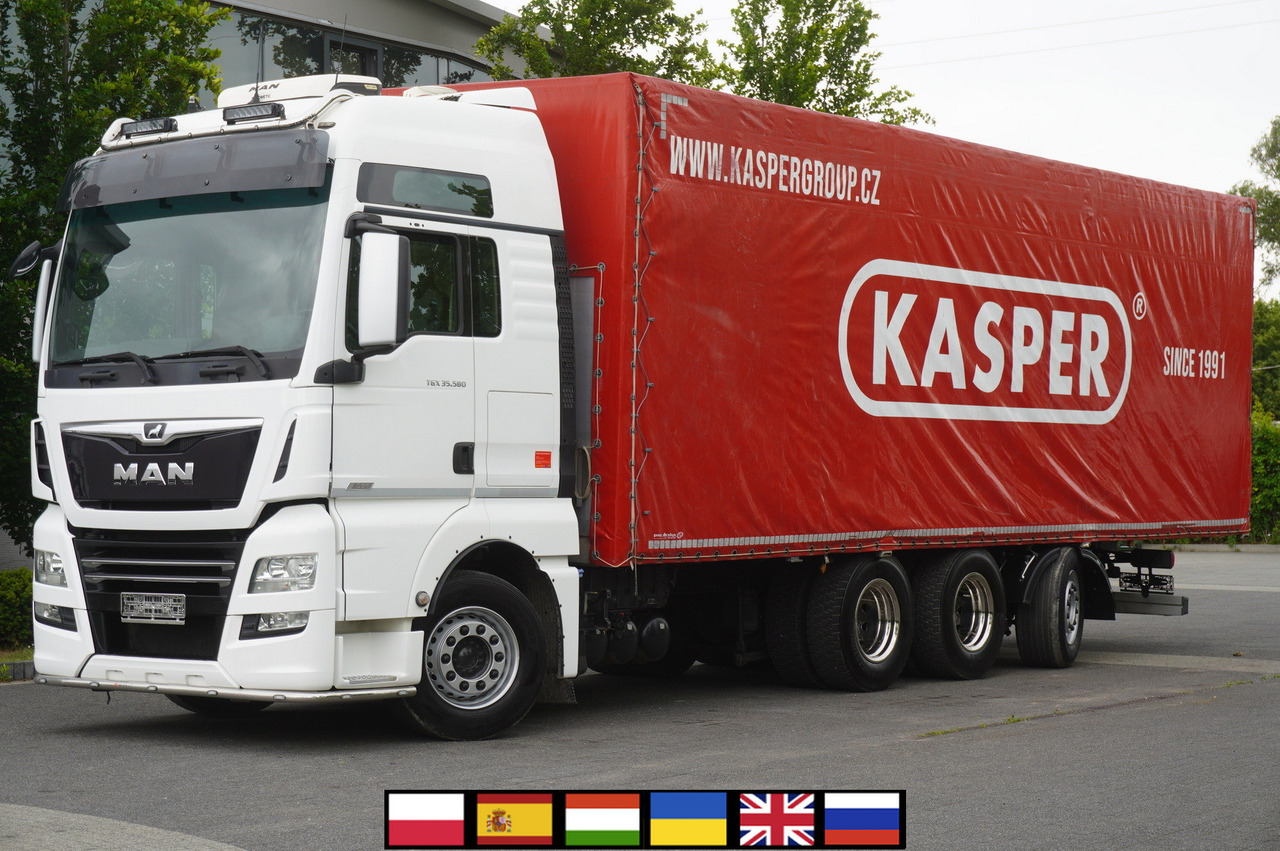MAN TGX 35.580 E6 8x4 /4 / 23 EPAL tarp superstructure / 4th axle steered - Тентованный грузовик: фото 1 MAN TGX 35.580 E6 8x4 /4 / 23 EPAL tarp superstructure / 4th axle steered - Тентованный грузовик: фото 1