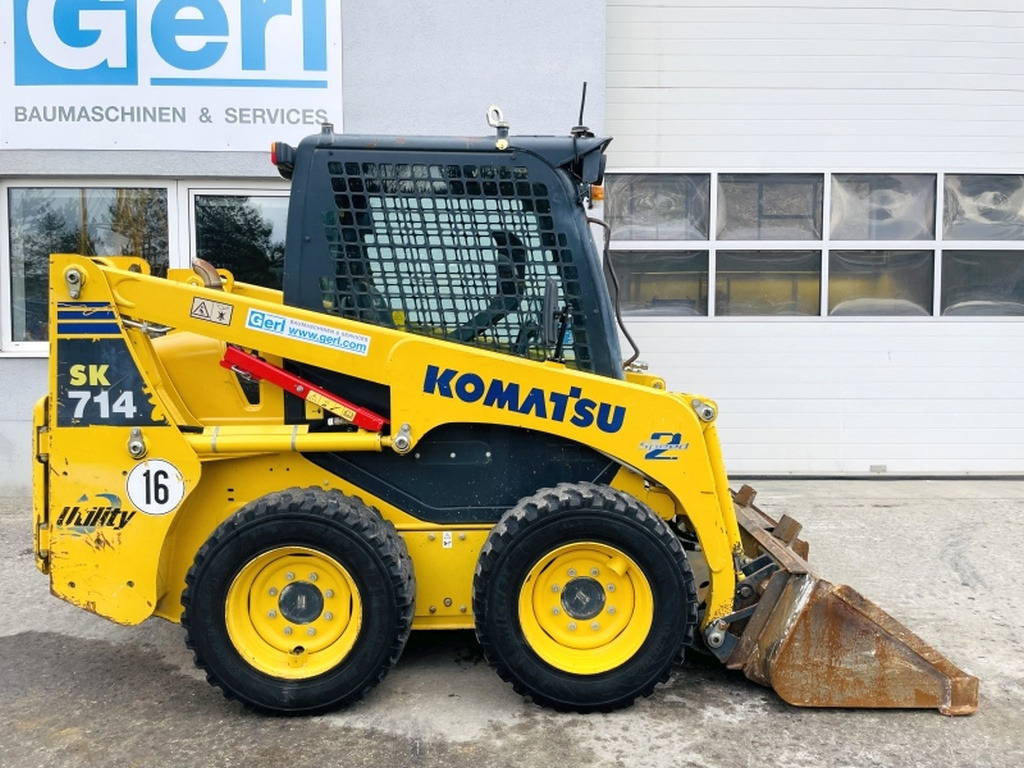 Komatsu SK714-5 (3947) - Мини-погрузчик с бортовым поворотом: фото 2 Komatsu SK714-5 (3947) - Мини-погрузчик с бортовым поворотом: фото 2