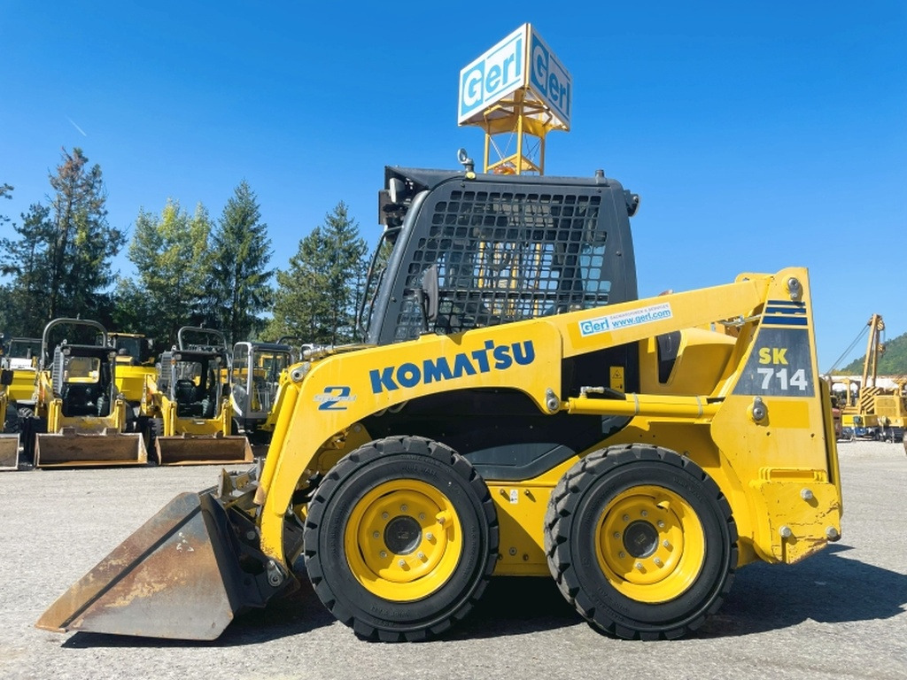 Komatsu SK714-5 (4066) - Мини-погрузчик с бортовым поворотом: фото 1 Komatsu SK714-5 (4066) - Мини-погрузчик с бортовым поворотом: фото 1