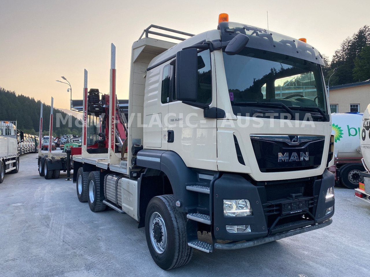 MAN 33.500 6X6 mit Kran PENZ 12Z - Лесовоз, Автоманипулятор: фото 2 MAN 33.500 6X6 mit Kran PENZ 12Z - Лесовоз, Автоманипулятор: фото 2