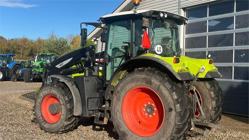Claas ARION 650 CIS+ Focus med frontlift og frontlæsser - Трактор: фото 3 Claas ARION 650 CIS+ Focus med frontlift og frontlæsser - Трактор: фото 3