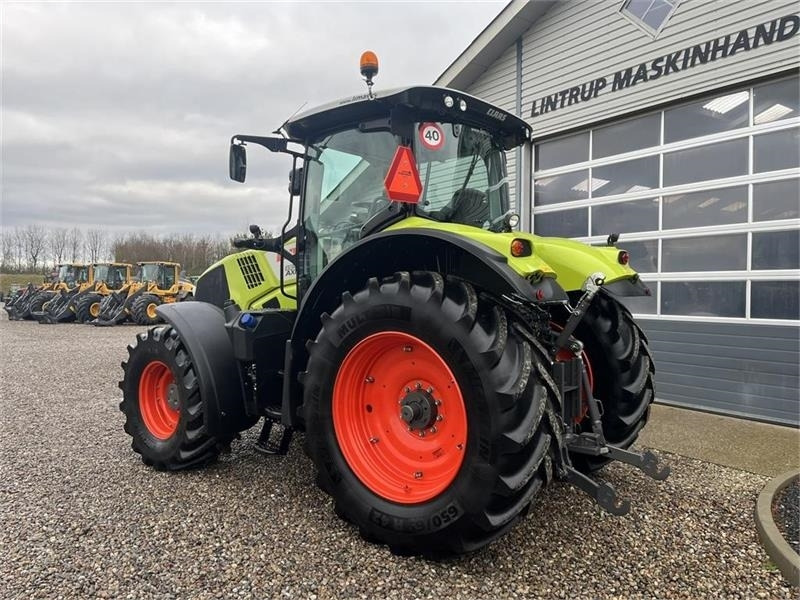 Трактор Claas Axion 830 med frontlift og front PTO: фото 9 Трактор Claas Axion 830 med frontlift og front PTO: фото 9