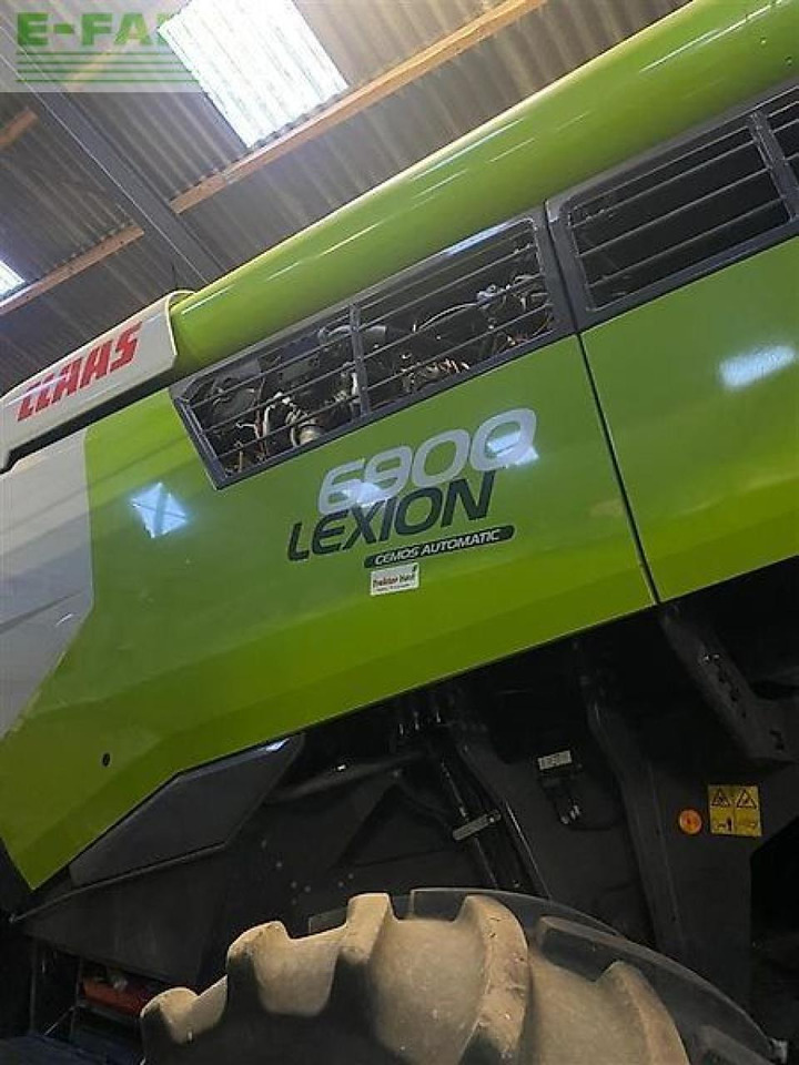 CLAAS lexion 6900 4wd med macdon 35 fod flex skærebord - Зерноуборочный комбайн: фото 1 CLAAS lexion 6900 4wd med macdon 35 fod flex skærebord - Зерноуборочный комбайн: фото 1