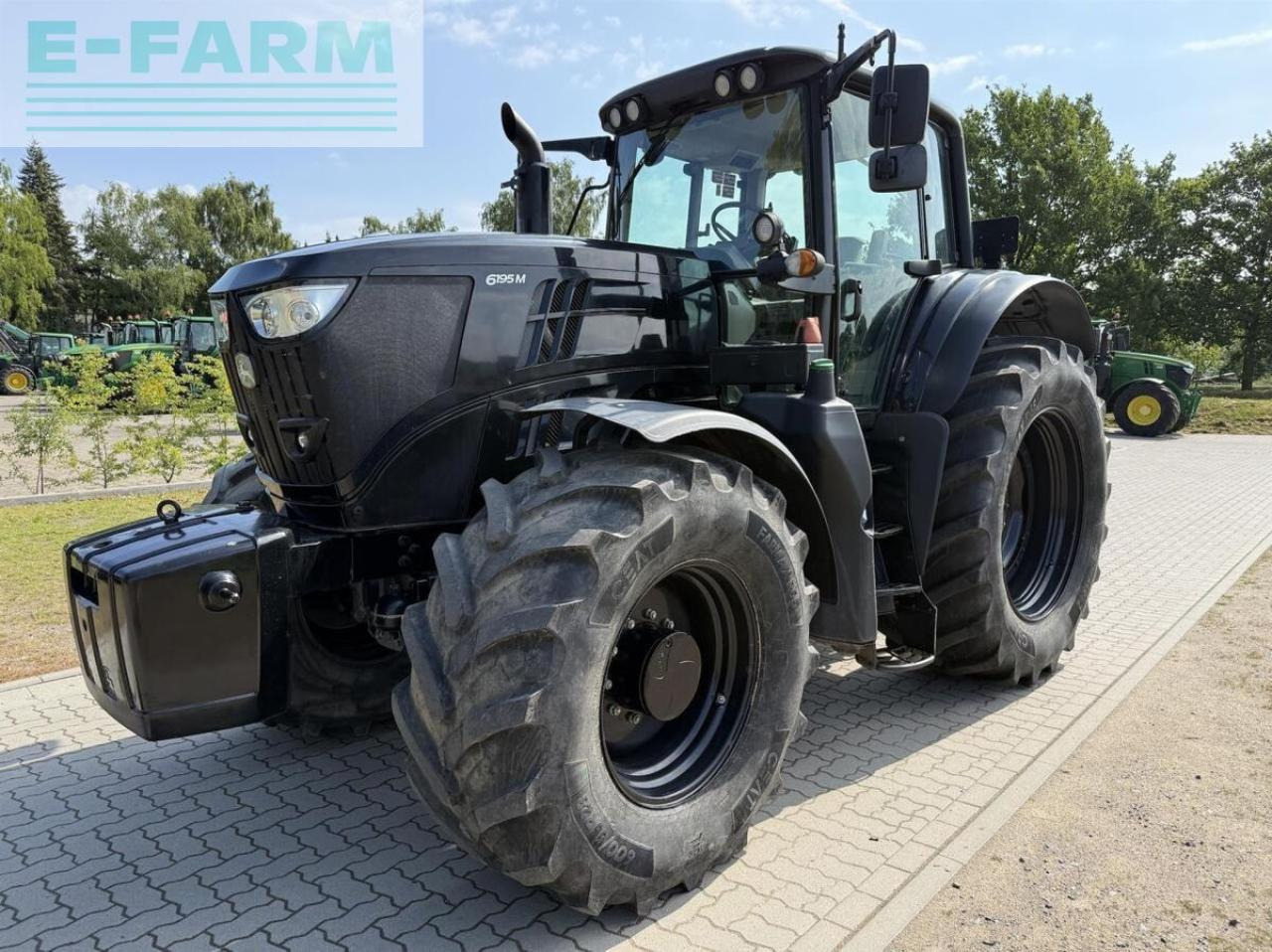 John Deere 6195m black - Трактор: фото 1 John Deere 6195m black - Трактор: фото 1