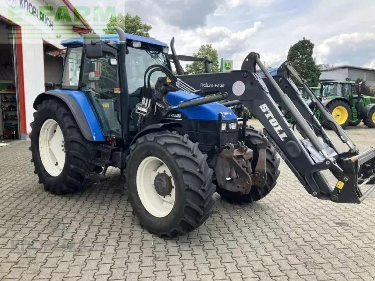 New Holland ts 115 - Трактор: фото 3 New Holland ts 115 - Трактор: фото 3