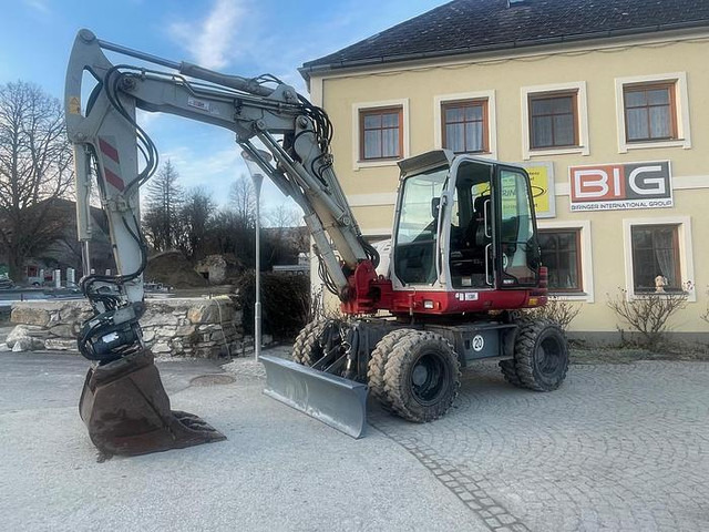 Takeuchi TB295W Mobilbagger - Экскаватор: фото 1 Takeuchi TB295W Mobilbagger - Экскаватор: фото 1