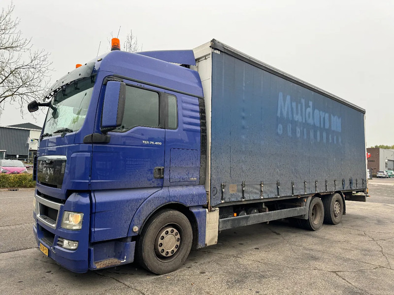MAN TGX 26.400 6X2 - EURO 4 + LIFT + STEERING AXLE + TÜV 10-2025 - Тентованный грузовик: фото 1 MAN TGX 26.400 6X2 - EURO 4 + LIFT + STEERING AXLE + TÜV 10-2025 - Тентованный грузовик: фото 1