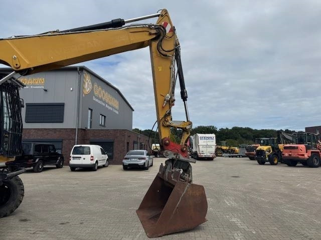 CAT M 318F - Колёсный экскаватор: фото 4 CAT M 318F - Колёсный экскаватор: фото 4