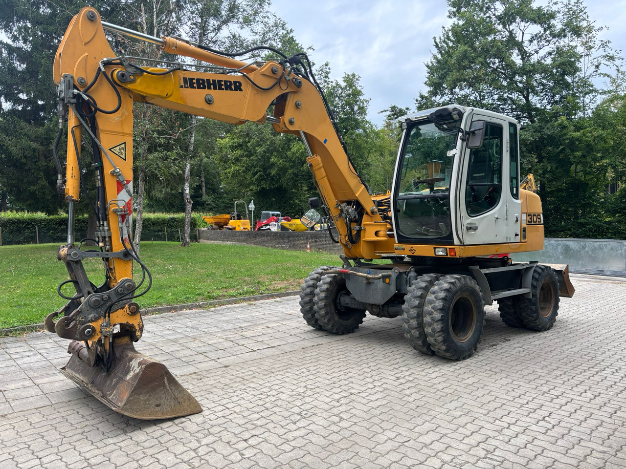 LIEBHERR A 309 Litronic - Колёсный экскаватор: фото 3 LIEBHERR A 309 Litronic - Колёсный экскаватор: фото 3
