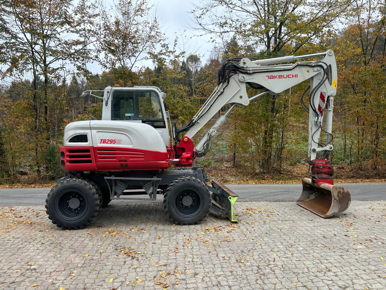 TAKEUCHI TB 295 W - Колёсный экскаватор: фото 2 TAKEUCHI TB 295 W - Колёсный экскаватор: фото 2