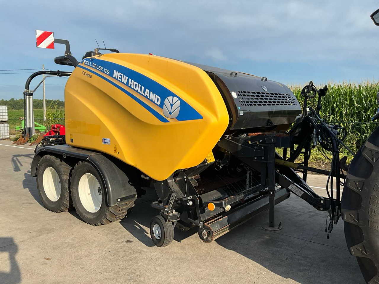 New Holland Roll Baler 125 Combi - Пресс-подборщик рулонный: фото 2 New Holland Roll Baler 125 Combi - Пресс-подборщик рулонный: фото 2