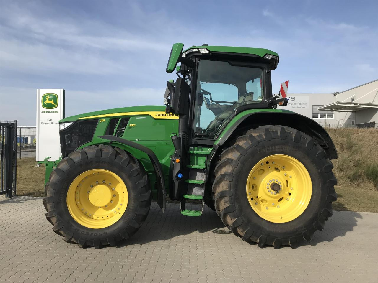 John Deere 7R 310 - Трактор: фото 1 John Deere 7R 310 - Трактор: фото 1