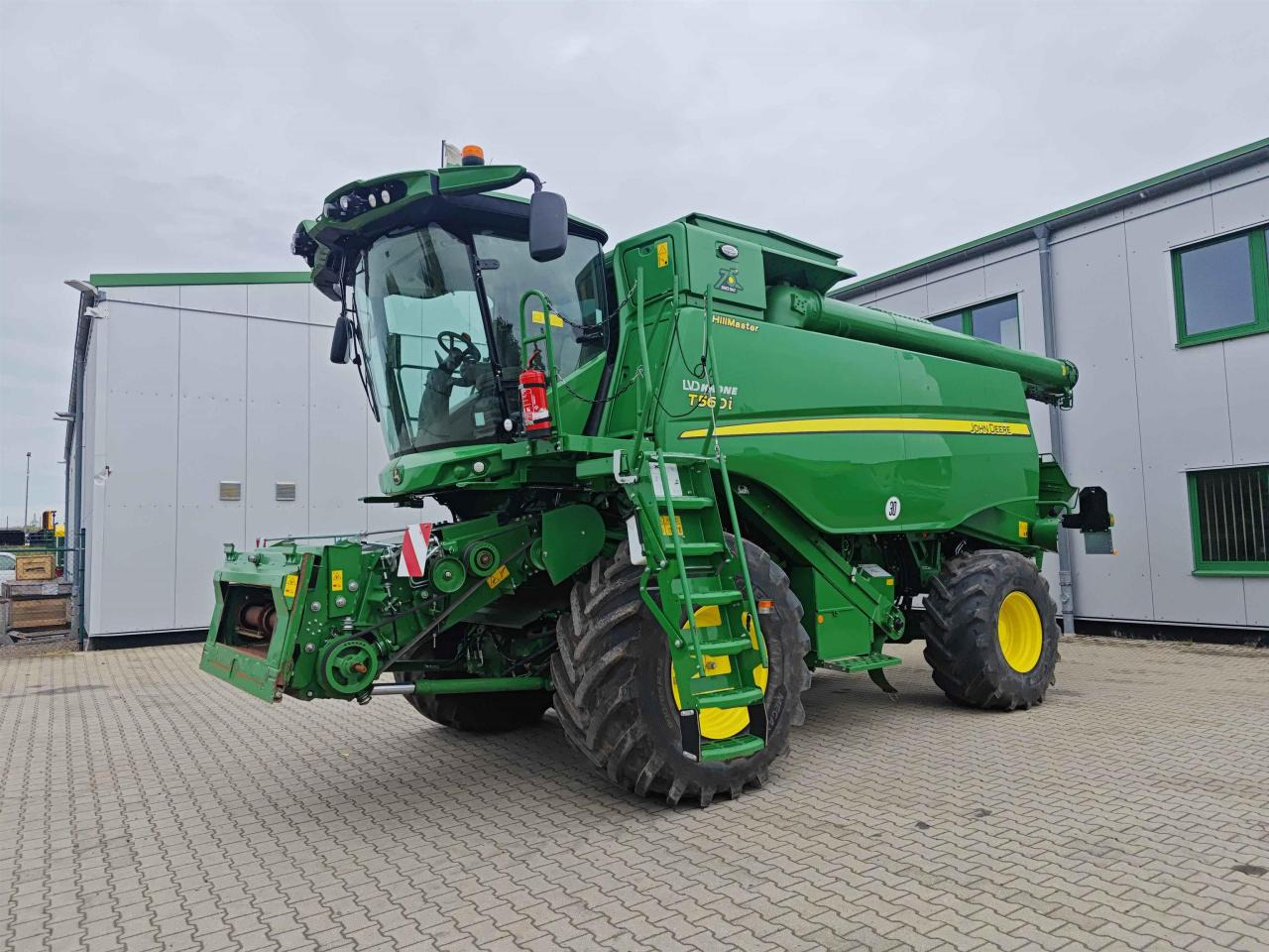 John Deere T560 Hillmaster - Зерноуборочный комбайн: фото 1 John Deere T560 Hillmaster - Зерноуборочный комбайн: фото 1
