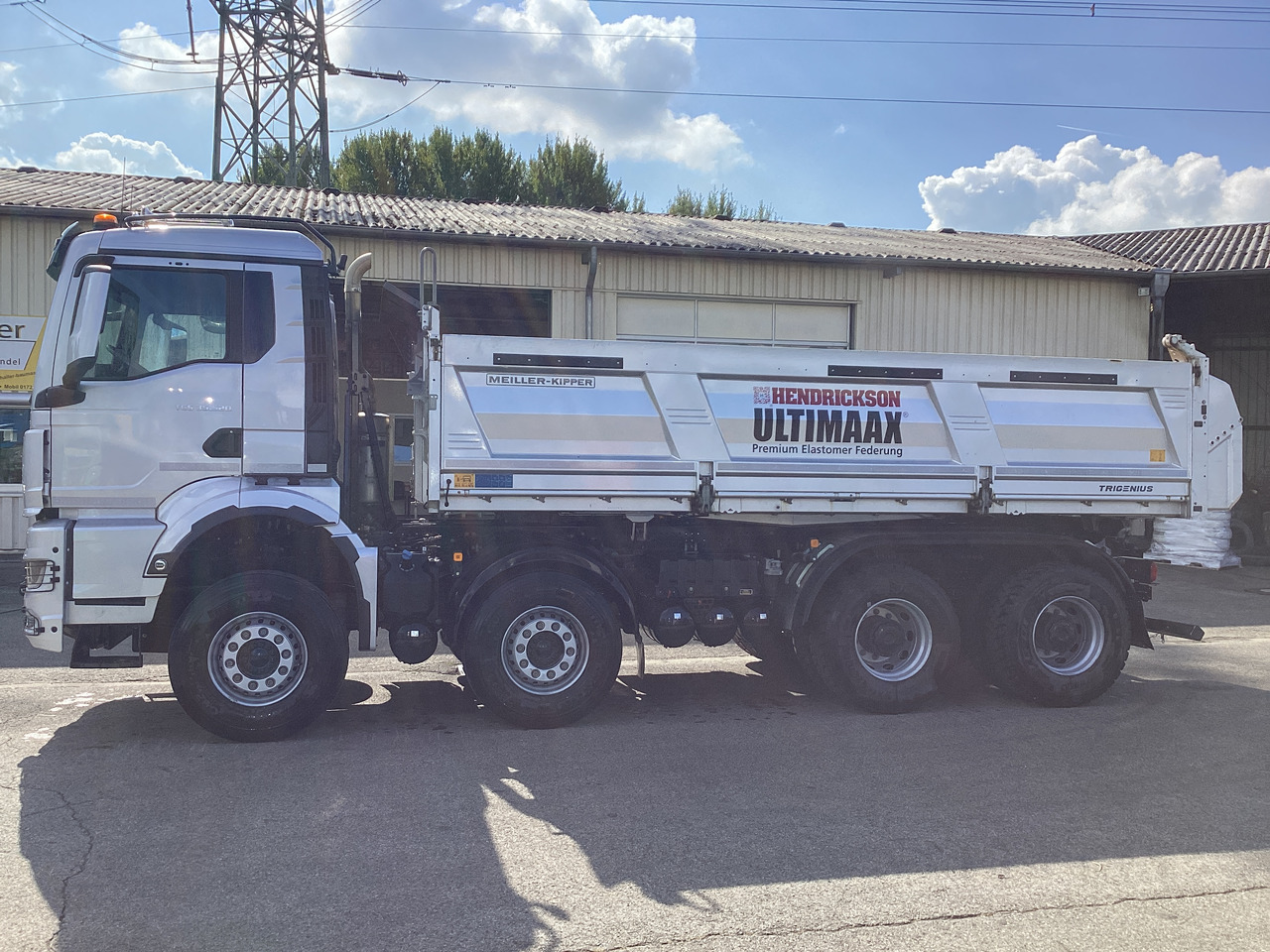 MAN TGS 35.520 8×4 BB Hendrickson - Самосвал: фото 4 MAN TGS 35.520 8×4 BB Hendrickson - Самосвал: фото 4