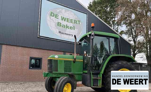 John Deere 6100 - Трактор: фото 1 John Deere 6100 - Трактор: фото 1