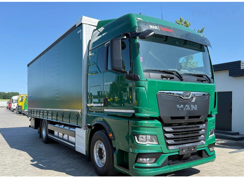 MAN TGX 18.470 - Curtain side - Тентованный грузовик: фото 2 MAN TGX 18.470 - Curtain side - Тентованный грузовик: фото 2