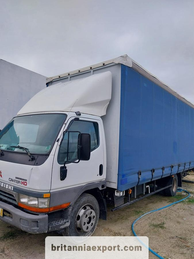MITSUBISHI Canter FE659 HD 3.9 TD | Euro 2 | 7.5 ton | Tail Lift - Тентованный грузовик: фото 1 MITSUBISHI Canter FE659 HD 3.9 TD | Euro 2 | 7.5 ton | Tail Lift - Тентованный грузовик: фото 1