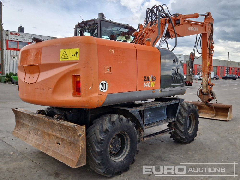 Hitachi ZX140W-3 - Колёсный экскаватор: фото 5 Hitachi ZX140W-3 - Колёсный экскаватор: фото 5